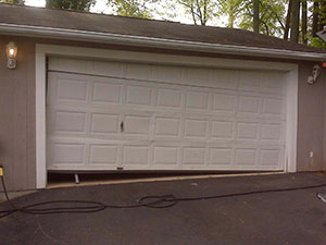 picture of a dented garage door
